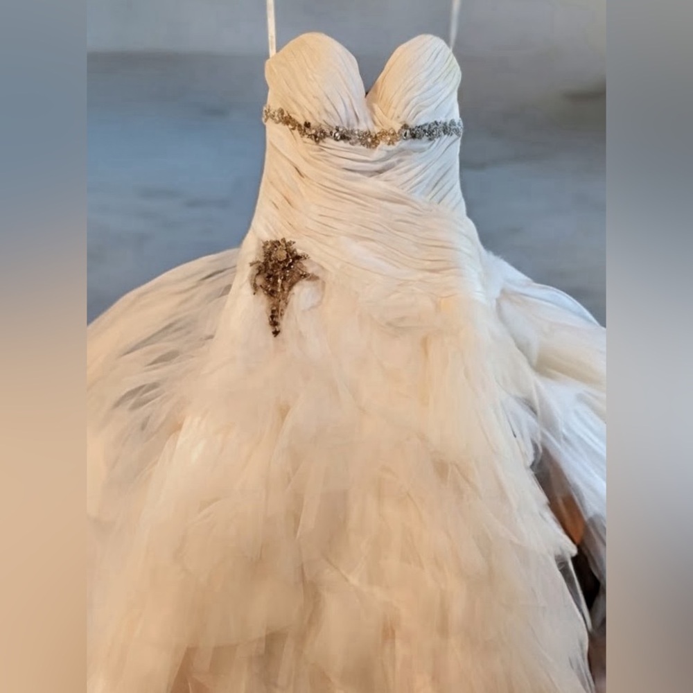 Winnie Couture Elegant White Strapless wedding Gown with crystal Floral Accent.